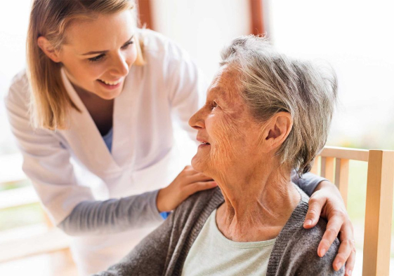 older lady with nurse