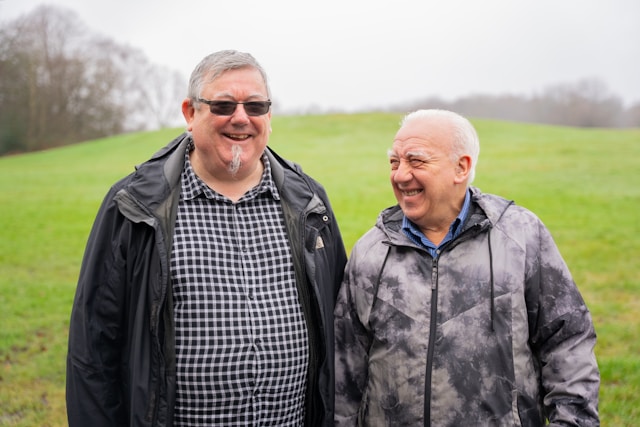 Two elderly men outside 